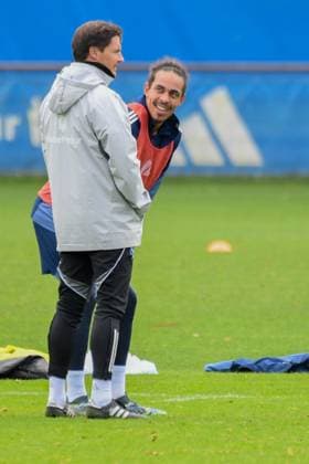 Yussuf Poulsen talks and laughs with coach Merlin Polzin HSV Germany , Hamburg , Volksparkstadion , Training ground soccer , 1 Bundesliga , Training of Hamburger SV