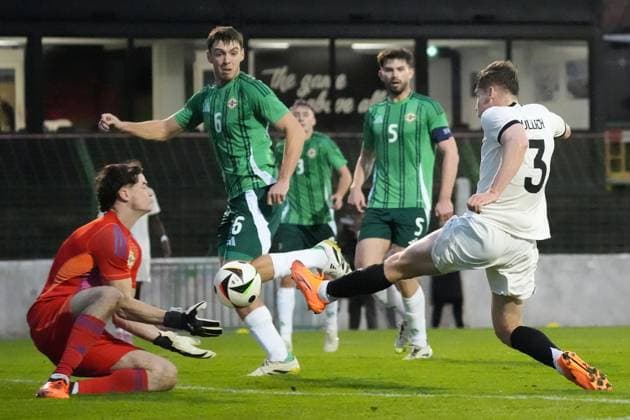 Chance for Lukas Ullrich Germany U21, 3 but he collides with goalkeeper Stephen McMullan Northern Ireland, Northern Ireland, 1 Belfast 14 10 2025 Northern Ireland v Germany U21, European Championship Qualification, The Oval