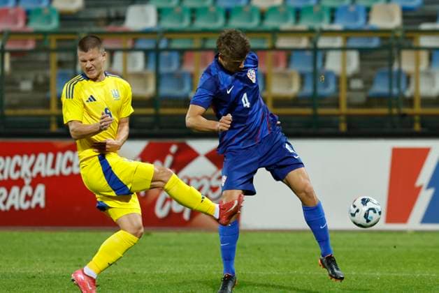 Croatia, Velika Gorica, 141025. Players Artem Slesar and Luka Vuskovic at the qualifying match of group 8 for the U21, U 21 European Football Championship, Croatia - Ukraine. Photo: Marko Todorov CROPIX Copyright: xxMarkoxTodorovx xCROPIXx hrvatska_ukrajina31-141025