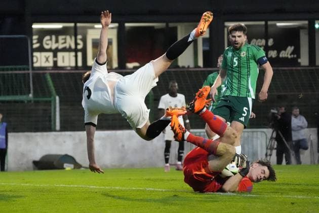 Chance for Lukas Ullrich Germany U21, 3 but he collides with goalkeeper Stephen McMullan Northern Ireland, Northern Ireland, 1 Belfast 14 10 2025 Northern Ireland v Germany U21, European Championship Qualification, The Oval