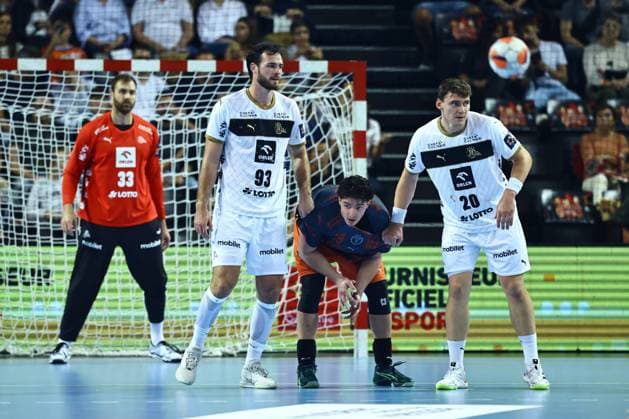 HANDBALL : Montpellier HB vs. THW Kiel - EHF - 14 10 2025 DÃ fense Kiel, Veron NACIMOVIC (THW K), Lukas LAUBE (THW K) lors du match Montpellier HB vs. THW Kiel de la compÃ tition EHF a l™Arena Sud de France, le 14 octobre 2025. MontpellierFrance  Copyright: xValentinaxClaretx