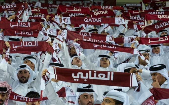 UQATAR v NITED ARAB EMIRATES-2026 FIFA World Cup, WM, Weltmeisterschaft, Fussball ASIAN QUALIFIER PLAYOFFS Fans of Qatar cheer during the FIFA World Cup 2026 AFC Asian qualifiers playoffs group A match between Qatar and United Arab Emirates at Jassim Bin Hamad Stadium in Doha, Qatar, on October 14, 2025. DOHA Qatar Copyright: xNOUSHADx
