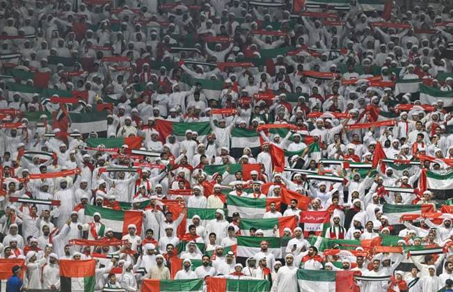 UQATAR v NITED ARAB EMIRATES-2026 FIFA World Cup, WM, Weltmeisterschaft, Fussball ASIAN QUALIFIER PLAYOFFS Fans of United Arab Emirates cheer during the FIFA World Cup 2026 AFC Asian qualifiers playoffs group A match between Qatar and United Arab Emirates at Jassim Bin Hamad Stadium in Doha, Qatar, on October 14, 2025. DOHA Qatar Copyright: xNOUSHADx