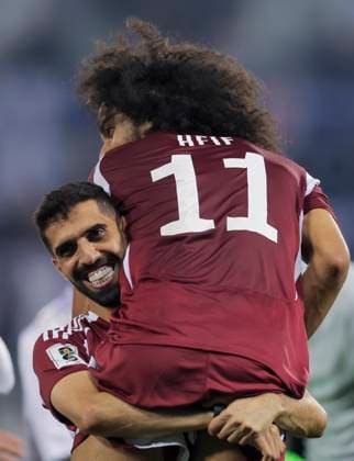 UQATAR v NITED ARAB EMIRATES-2026 FIFA World Cup, WM, Weltmeisterschaft, Fussball ASIAN QUALIFIER PLAYOFFS Hasan Al Haydos and Akram Afif of Qatar celebrate after the team s victory in the FIFA World Cup 2026 AFC Asian qualifiers playoffs group A match between Qatar and United Arab Emirates at Jassim Bin Hamad Stadium in Doha, Qatar, on October 14, 2025. DOHA Qatar Copyright: xNOUSHADx