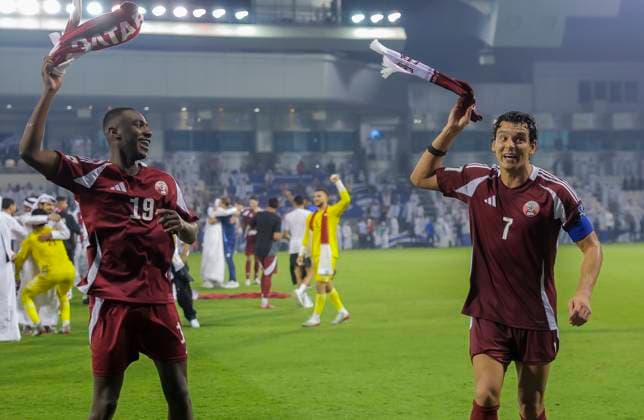 UQATAR v NITED ARAB EMIRATES-2026 FIFA World Cup, WM, Weltmeisterschaft, Fussball ASIAN QUALIFIER PLAYOFFS Almoez Ali (L) and Andres Sebastian Quintana (R) of Qatar celebrate after the team s victory in the FIFA World Cup 2026 AFC Asian qualifiers playoffs group A match between Qatar and United Arab Emirates at Jassim Bin Hamad Stadium in Doha, Qatar, on October 14, 2025. DOHA Qatar Copyright: xNOUSHADx