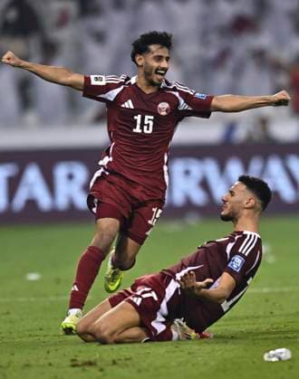 (251015) -- DOHA, Oct. 15, 2025 -- Ahmed Alganehi (L) of Qatar celebrates after the FIFA World Cup, WM, Weltmeisterschaft, Fussball 2026 AFC Asian Qualifiers group A playoffs match between Qatar and United Arab Emirates in Doha, Qatar, Oct. 14, 2025. (Photo by Xinhua) (SP)QATAR-DOHA-FOOTBALL-PLAYOFFS ASIAN QUALIFIERS-FIFA WORLD CUP 2026-QATAR VS UNITED ARAB EMIRATES Nikku 