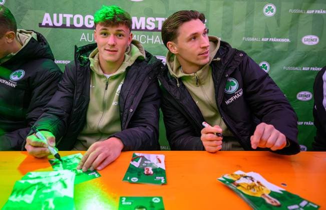 14 10 2025 SpVgg Greuther Fürth Fuerth autograph session at Fürth church fair xwoxzix Lukas Reich 2, SpVgg Greuther Fürth Nils Körber 1, SpVgg Greuther Fürth signs autographs
