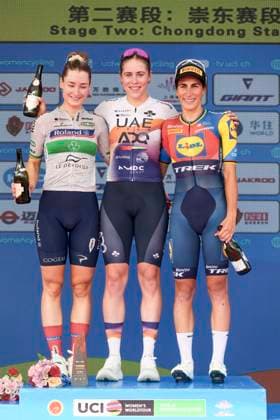 (251015) -- SHANGHAI, Oct. 15, 2025 -- Sofie Van Rooijen (C) of UAE Team ADQ, Mia Griffin (L) of Roland Le Devoluy and Elisa Balsamo of Lidl-Trek pose on the podium after Stage 2 of the UCI Women s WorldTour Tour of Chongming Island Road cycling, Rad, Radsport, Strasse race in Shanghai, east China, Oct. 15, 2025. ) (SP)CHINA-SHANGHAI-CYCLING-UCI WOMEN S WORLDTOUR-TOUR OF CHONGMING ISLAND (CN) WangxXiang 