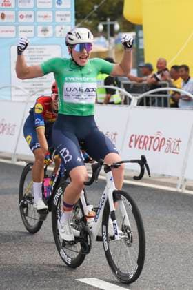 (251015) -- SHANGHAI, Oct. 15, 2025 -- Sofie Van Rooijen of UAE Team ADQ celebrates after crossing the finish line in Stage 2 of the UCI Women s WorldTour Tour of Chongming Island Road cycling, Rad, Radsport, Strasse race in Shanghai, east China, Oct. 15, 2025. ) (SP)CHINA-SHANGHAI-CYCLING-UCI WOMEN S WORLDTOUR-TOUR OF CHONGMING ISLAND (CN) WangxXiang 
