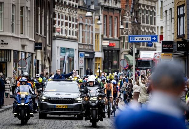 DORDRECHT - Cyclists cycle through the center of Dordrecht during the start of the first stage of the Tour of Holland. For the first time in 21 years, a cycling race will be held on Dutch soil. ANP KOEN VAN WEEL xVIxANPxSportx xxANPxIVx 539252516 originalFilename: 539252516.jpg