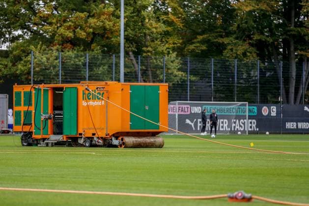 Heiler Sporthybrid R Hybrid turf machine lays turf Germany , Hamburg , Training ground at Kollaustrasse , Football , 1 Bundesliga , Training of FC St Pauli