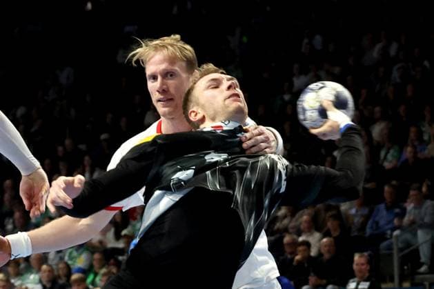 DEU, Machineseeker EHF Champions League, Fuechse Berlin vs Kolstad Handball, 16 10 2025, Max Schmeling Halle, Berlin, DEU, Machineseeker EHF Champions League, Fuechse Berlin vs Kolstad Handball, in the picture Mathias Gidsel Fuechse Berlin 19 , Magnus Gullerud Kolstad Handball 14 , nordphotoxGmbHx xEngler nph00076