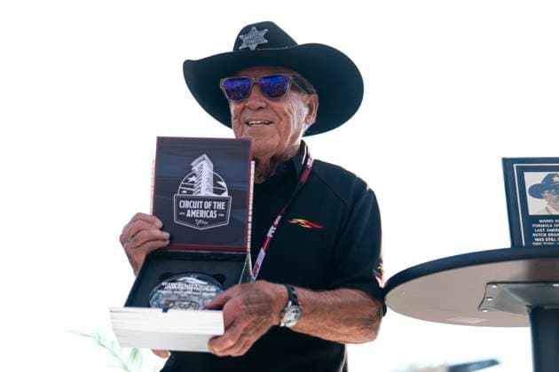 Mario Andretti is presented a sample of asphalt from the newly renamed Andretti Turn 20 during a dedication ceremony at the Formula One United States Grand Prix at the Circuit of the Americas in Austin, Texas on Thursday, October 16, 2025.  AUS2025101645 GREGxNASH