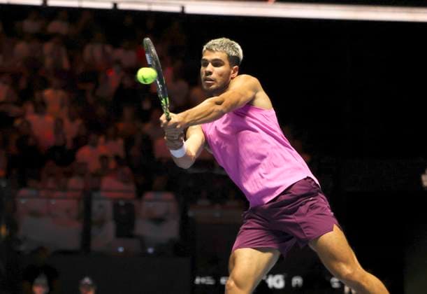 (251017) -- RIYADH, Oct. 17, 2025 -- Carlos Alcaraz of Spain hits a return during the semifinal match against Taylor Fritz of the United States at the Six Kings Slam tennis tournament in Riyadh, Saudi Arabia, Oct. 16, 2025. ) (SP)SAUDI ARABIA-RIYADH-TENNIS-6 KINGS SLAM-SEMIFINAL LuoxChen 