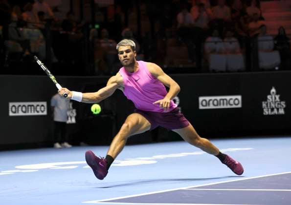 (251017) -- RIYADH, Oct. 17, 2025 -- Carlos Alcaraz of Spain hits a return during the semifinal match against Taylor Fritz of the United States at the Six Kings Slam tennis tournament in Riyadh, Saudi Arabia, Oct. 16, 2025. ) (SP)SAUDI ARABIA-RIYADH-TENNIS-6 KINGS SLAM-SEMIFINAL LuoxChen 