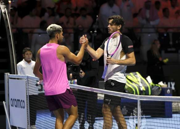 (251017) -- RIYADH, Oct. 17, 2025 -- Carlos Alcaraz (L) of Spain and Taylor Fritz of the United States shake hands after their semifinal match at the Six Kings Slam tennis tournament in Riyadh, Saudi Arabia, Oct. 16, 2025. ) (SP)SAUDI ARABIA-RIYADH-TENNIS-6 KINGS SLAM-SEMIFINAL LuoxChen 