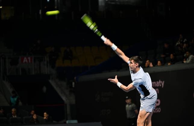 (251017) -- ALMATY, Oct. 17, 2025 -- Fabian Marozsan of Hungary serves during the men s singles quarterfinal match against Daniil Medvedev of Russia at the ATP250 Almaty Tennis Open in Almaty, Kazakhstan, on Oct. 17, 2025. ) (SP)KAZAKHSTAN-ALMATY-TENNIS-ALMATY OPEN-QUARTERFINAL LixRenzi 