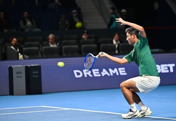 (251017) -- ALMATY, Oct. 17, 2025 -- Mochizuki Shintaro of Japan hits a return during the men s singles quarterfinal against Alex Michelsen of the United States at the ATP250 Almaty Tennis Open in Almaty, Kazakhstan, Oct. 17, 2025. ) (SP)KAZAKHSTAN-ALMATY-TENNIS-ALMATY OPEN-QUARTERFINAL LixRenzi 