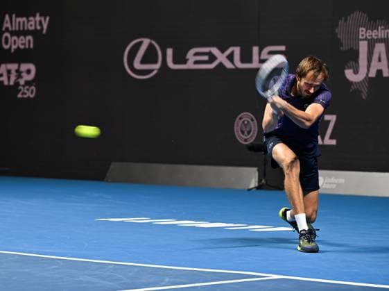 (251017) -- ALMATY, Oct. 17, 2025 -- Daniil Medvedev of Russia hits a return during the men s singles quarterfinal match against Fabian Marozsan of Hungary at the ATP250 Almaty Tennis Open in Almaty, Kazakhstan, on Oct. 17, 2025. ) (SP)KAZAKHSTAN-ALMATY-TENNIS-ALMATY OPEN-QUARTERFINAL LixRenzi 