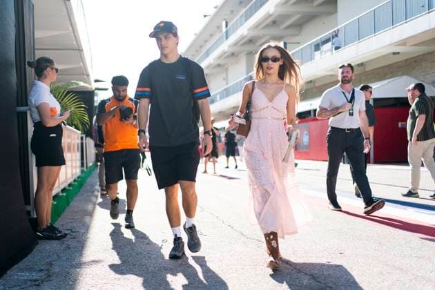 Australian Formula One driver Oscar Piastri of McLaren F1 Team and partner Lily Zneimer arrives at the Formula One United States Grand Prix at the Circuit of the Americas in Austin, Texas on Friday, October 17, 2025.  AUS2025101709 GREGxNASH