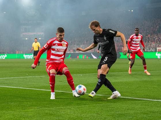 Soccer, Men, Season 2025 2026, 1 Bundesliga 7 Matchday , 1 FC Union Berlin Borussia Mönchengladbach, v l Andrej Ilic 1 FC Union Berlin , Marvin Friedrich Gladbach , 17 10 2025, Copyright: xSebastianxRäppold MatthiasxKochx