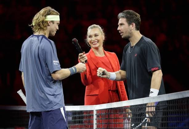 TENNIS - ATP, Tennis Herren Erste Bank Open VIENNA,AUSTRIA,17.OCT.25 - TENNIS - ATP World Tour, Erste Bank Open, Red Bull BassLine. Image shows Andrey Rublev (RUS), presenter Barbara Schett and Cameron Norrie (GBR).  GEPAxpictures xWalterxLuger