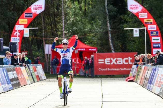 Dutch Delano Heeren celebrates as he crosses the finish line to win the men s junior race of the Exact Cross Essen, stage 2 (out of 7) in the Exact Cross cyclocross competition, Saturday 18 October 2025, in Essen. DAVIDxPINTENS  x137148628x