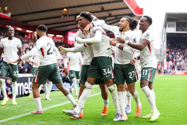 Nottingham, England, 18th October 2025. Josh Acheampong of Chelsea celebrates with teammates after scoring his team™s first goal during the Nottingham Forest vs Chelsea Premier League match at the City Ground, Nottingham. Picture credit should read: Jessica Hornby Sportimage EDITORIAL USE ONLY. No use with unauthorised audio, video, data, fixture lists, club league logos or live services. Online in-match use limited to 120 images, no video emulation. No use in betting, games or single club league player publications. SPI_044_JH_Forest_Chelsea SPI-4217-0044