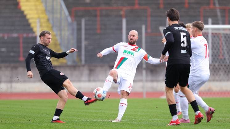 Hendrik Hofgärtner 28, FC Augsburg II and Albano Gashi 34, TSV Buchbach during the match between FC Augsburg II v TSV Buchbach, Soccer, Men, Regionalliga Bayern, 2025 2026, Match day 14 on 18 10 2025 in Augsburg, Rosenaustadion Bayern Germany