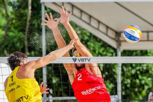 (251018) -- LAGUNA PROVINCE, Oct. 18, 2025 -- Javier Bello of England competes against Gianluca Dal Corso (R) of Italy during the men s quarterfinal match between Javier Bello Joaquin Bello of England and Samuele Cottafava Gianluca Dal Corso of Italy at the Volleyball World Beach Pro Tour in Laguna Province, the Philippines, Oct. 18, 2025. ) (SP)THE PHILIPPINES-LAGUNA PROVINCE-VOLLEYBALL WORLD BEACH PRO TOUR ROUELLExUMALI 