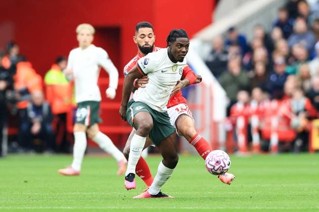 Nottingham, England, 18th October 2025. Romeo Lavia of Chelsea is challenged by Douglas Luiz of Nottingham Forest during the Nottingham Forest vs Chelsea Premier League match at the City Ground, Nottingham. Picture credit should read: Jessica Hornby Sportimage EDITORIAL USE ONLY. No use with unauthorised audio, video, data, fixture lists, club league logos or live services. Online in-match use limited to 120 images, no video emulation. No use in betting, games or single club league player publications. SPI_085_JH_Forest_Chelsea SPI-4217-0085