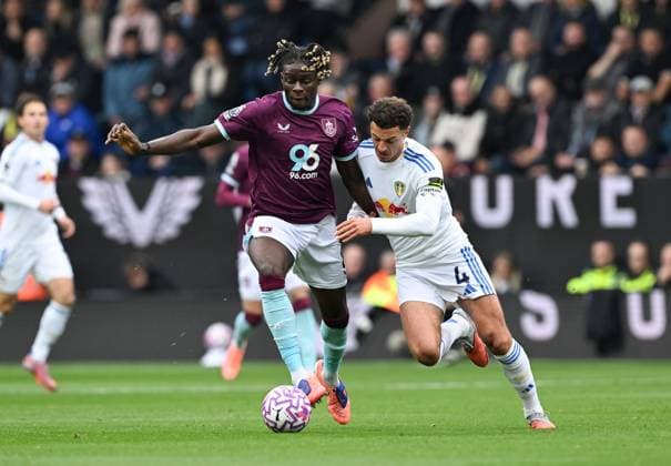 Lesley Ugochukwu of Burnley and Ethan Ampadu of Leeds United Burnley v Leeds United, Premier League, Football, Turf Moor, Burnley, UK - 18 Oct 2025Leeds Turf Moor United Kingdom EDITORIAL USE ONLY No use with unauthorised audio, video, data, fixture lists, club league logos or live services. Online in-match use limited to 120 images, no video emulation. No use in betting, games or single club league player publications.  Copyright: xAnnaxGowthorpe Shutterstockx 15544973v