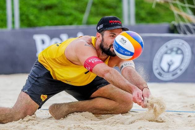 (251018) -- LAGUNA PROVINCE, Oct. 18, 2025 -- Christoph Dressler of Austria competes during the men s quarterfinal match between Christoph Dressler Philipp Waller of Austria and Tadeas Trousil Jiri Sedlak of the Czech Republic at the Volleyball World Beach Pro Tour in Laguna Province, the Philippines, Oct. 18, 2025. ) (SP)THE PHILIPPINES-LAGUNA PROVINCE-VOLLEYBALL WORLD BEACH PRO TOUR ROUELLExUMALI 