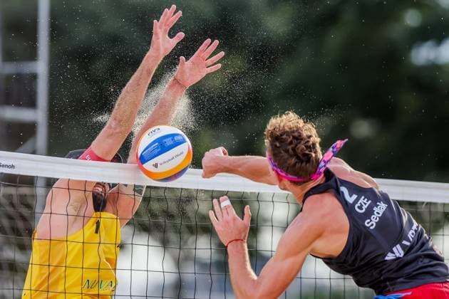 (251018) -- LAGUNA PROVINCE, Oct. 18, 2025 -- Jiri Sedlak (R) of the Czech Republic competes against Christoph Dressler of Austria during the men s quarterfinal match between Christoph Dressler Philipp Waller of Austria and Tadeas Trousil Jiri Sedlak of the Czech Republic at the Volleyball World Beach Pro Tour in Laguna Province, the Philippines, Oct. 18, 2025. ) (SP)THE PHILIPPINES-LAGUNA PROVINCE-VOLLEYBALL WORLD BEACH PRO TOUR ROUELLExUMALI 