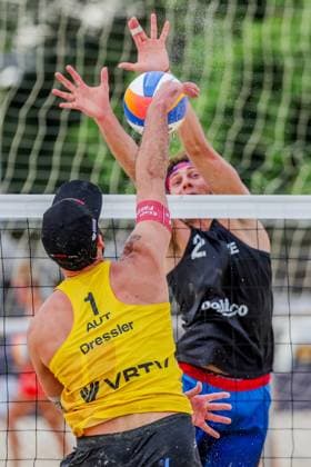 (251018) -- LAGUNA PROVINCE, Oct. 18, 2025 -- Jiri Sedlak (back) of the Czech Republic competes against Christoph Dressler of Austria during the men s quarterfinal match between Christoph Dressler Philipp Waller of Austria and Tadeas Trousil Jiri Sedlak of the Czech Republic at the Volleyball World Beach Pro Tour in Laguna Province, the Philippines, Oct. 18, 2025. ) (SP)THE PHILIPPINES-LAGUNA PROVINCE-VOLLEYBALL WORLD BEACH PRO TOUR ROUELLExUMALI 