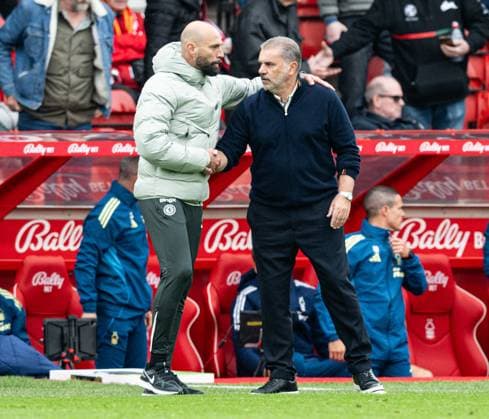 18th October 2025; The City Ground, Nottingham, England; Premier League Football, Nottingham Forest versus Chelsea; Nottingham Forest Head Coach Ange Postecoglou shakes hands with stand-in Chelsea Coach Willy Caballero as Chelsea Head Coach Enzo Maresca has a touchline ban  GodfreyxPitt