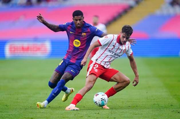 La Liga EA Sports. Date 9 Hugo Rincon of Girona FC and Marcus Rashford of FC Barcelona, Barca during the La Liga EA Sports match between FC Barcelona and Girona FC played at Lluis Companys Stadium on October 18, 2025 in Barcelona. kpng Copyright: xSergioxRuizx xImagox PS_2501018_BAR_GIR_2526_016