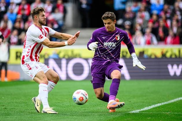 COLOGNE, GERMANY - 18 OCTOBER, 2025: Jan Thielmann, Finn Dahmen - The football match of Bundesliga 1. FC Koeln vs FC Augsburg at Rhein Energie Stadion.  Copyright: xVITALIIxKLIUIEVx