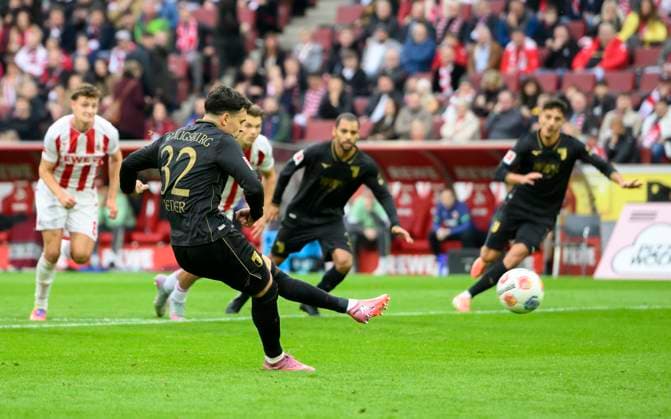 Fabian Rieder FC Augsburg scores from the penalty spot to make it 0 1 Action, Soccer 1 Bundesliga, Matchday 7, 1 FC Koeln FC Augsburg, on 18 10 2025 in Koeln Germany DFL regulations prohibit any use of photographs as image sequences and or quasi video Â