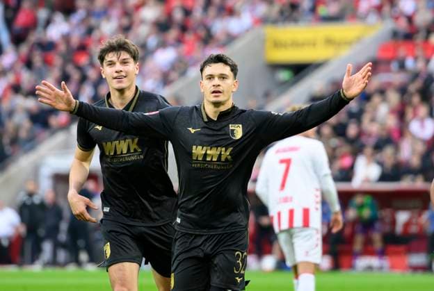 Cheering Fabian Rieder FC Augsburg after his goal to 0 1, l Mert Koemuer FC Augsburg Football 1 Bundesliga, 7 Matchday, 1 FC Koeln FC Augsburg, am 18 10 2025 in Koeln Germany DFL regulations prohibit any use of photographs as image sequences and or quasi video Â