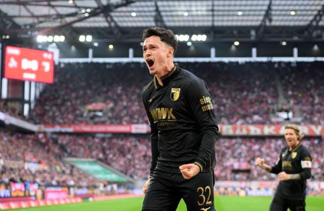 Cheering Fabian Rieder FC Augsburg after his goal to 0 1, Soccer 1 Bundesliga, 7 Matchday, 1 FC Koeln FC Augsburg, on 18 10 2025 in Koeln Germany DFL regulations prohibit any use of photographs as image sequences and or quasi video Â
