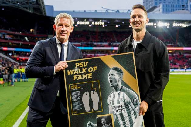 Luuk de Jong receives a tile on the Walk of Fame at PSV Eindhoven, presented by General Manager Marcel Brands of PSV Eindhoven. PSV Eindhoven v Go Ahead Eagles, Eredivisie, PSV v Go Ahead Eagles, Philips Stadion, October 18, 2025, Eindhoven, Netherlands.