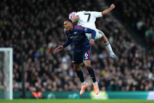 Premier League Fulham v Arsenal Gabriel of Arsenal and Raul Jimenez of Fulham during the Premier League match Fulham vs Arsenal at Craven Cottage, London, United Kingdom, 18th October 2025 (Photo by Harvey Murphy News Images) Copyright: xHarveyxMurphy NewsxImagesx