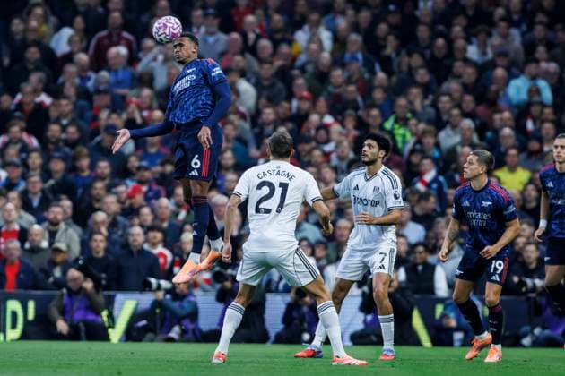Football - 2025 2026 Premier League - Fulham vs Arsenal - Craven Cottage - Saturday 18th October 2025 Gabriel (Arsenal FC) rises high to clear with his head at Craven Cottage COLORSPORT DANIEL BEARHAM  csp_ful_ars_db_18102025_