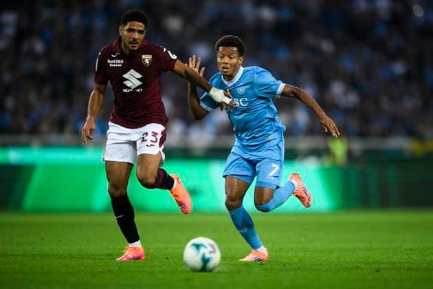 Torino FC v SSC Napoli - Serie A David Neres of SSC Napoli competes for the ball with Saul Coco of Torino FC during the Serie A football match between Torino FC and SSC Napoli. Turin Italy Copyright: xNicolòxCampox