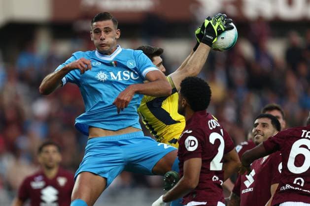 Lorenzo Lucca (Ssc Napoli) und Franco Israel (Torino Fc) battle for the ball, Serie A, Torino FC v SSC Napoli, Olimpico, October 18, 2025, Turin, Italy.