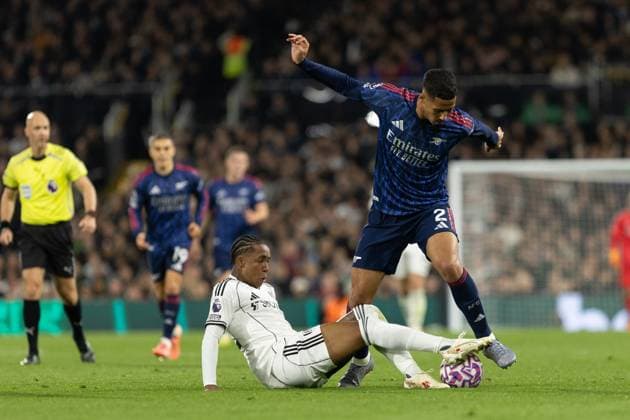 Kevin of Fulham tackles William Saliba of Arsenal during the Premier League match between Fulham and Arsenal at Craven Cottage on October 18, 2025 in London, England. (Photo by Pedro Soares SPP) Copyright: xPedroxSoaresx xSPPx Sportspressphoto_SPR44139