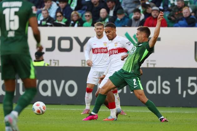 VfL vs Stuttgart, 1 BL Wolfsburg, 18 10 2025, FOOTBALL VfL Wolfsburg vs VfB Stuttgart, 1 BL, Season 2025 26 Nikolas Nartey VfB Stuttgart , Kilian Fischer VfL Wolfsburg Wolfsburg