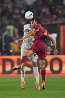 Alessandro Bastoni of F.C. Inter and Bryan Cristante of A.S. Roma are in action during the 7th day of the Serie A Championship between A.S. Roma and F.C. Inter at the Olympic Stadium on October 18, 2025 in Rome, Italy.  Copyright: xDomenicoxCippitelli IPAxSportx xipa-agency.netx xx IPA_66760728 IPA_Agency_IPA66760728