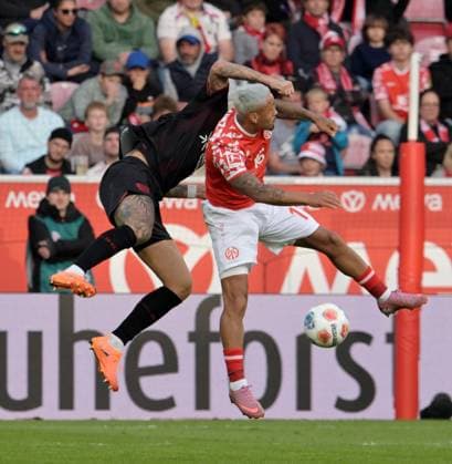 Armindo Sieb re vs Robert Andrich photographed at the soccer Bundesliga match Mainz 05 vs Bayer 04 Leverkusen on 18 10 2025 in Mainz DFL DFB REGULATIONS PROHIBIT ANY USE OF PHOTOGRAPHS as IMAGE SEQUENCES and or QUASI VIDEO